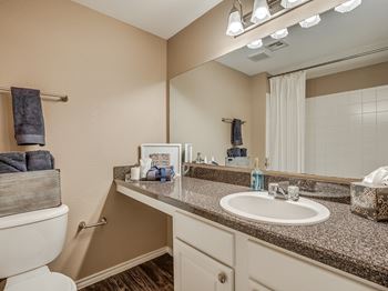 Bathroom With Granite Vanities